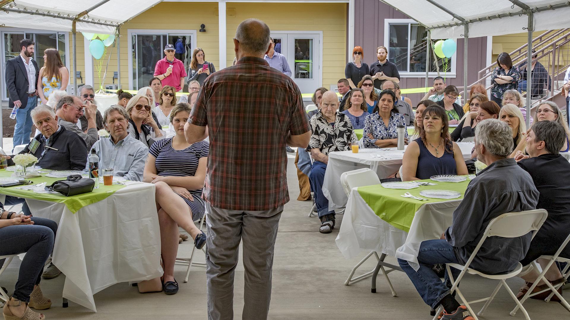 Rural Communities Housing Development Corporations Chief Executive Officer Brad McDonald speaking about this wonderful addition to our community. slide image